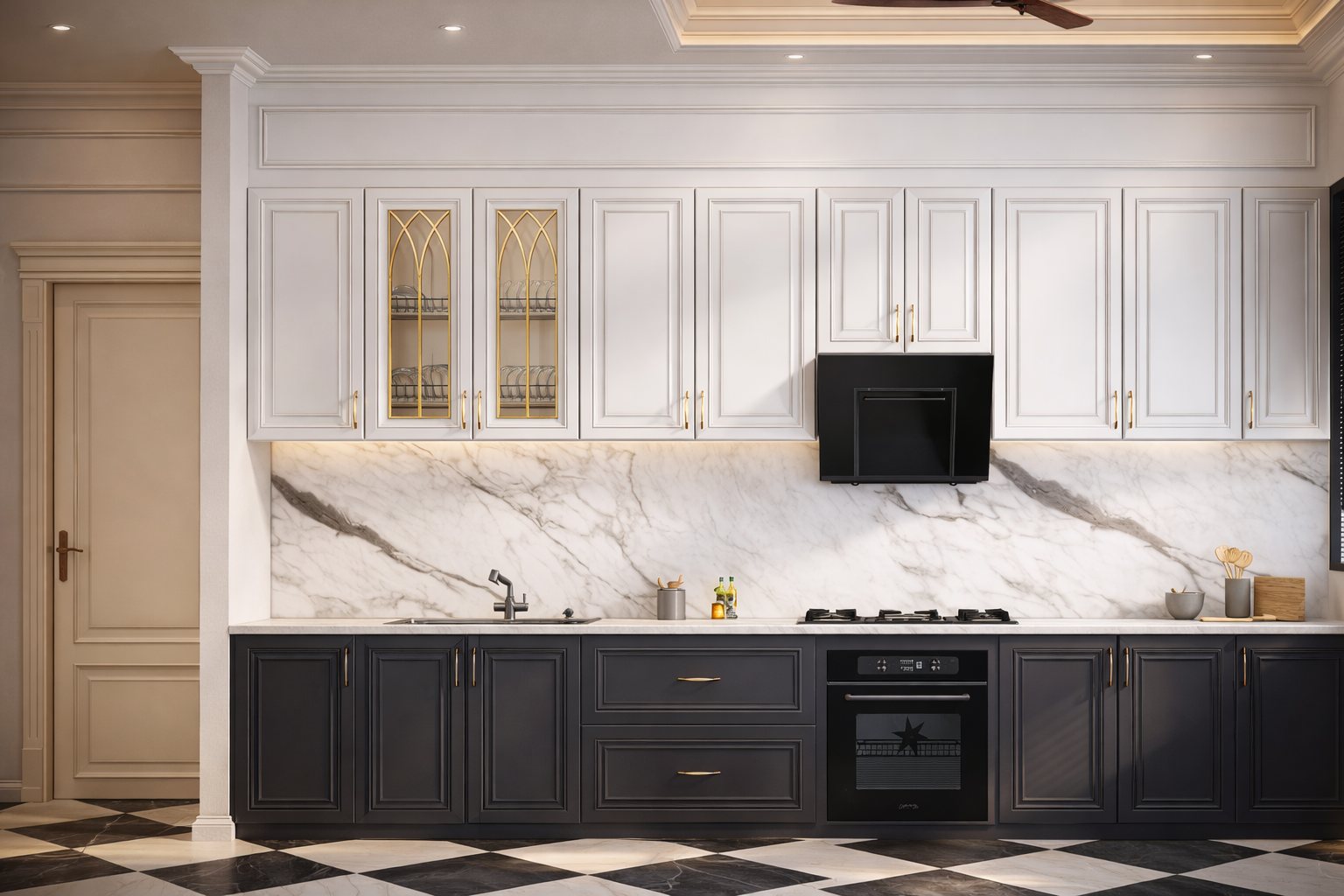 The kitchen in marble and dark cabinetry.