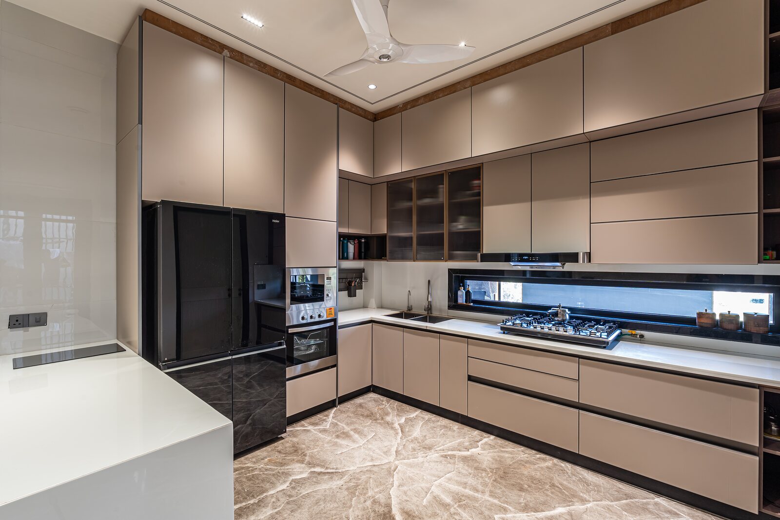 The kitchen in beige and marble.