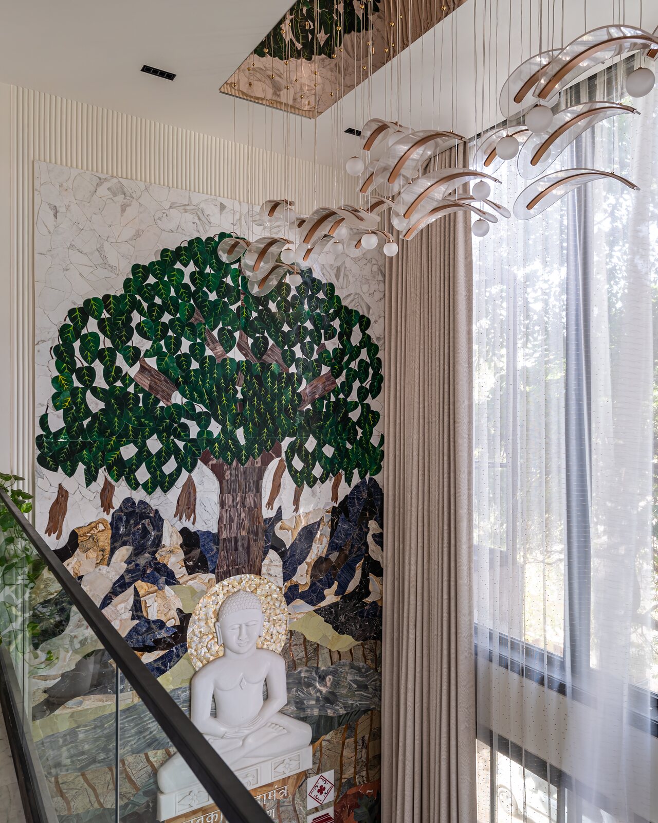 The mural up close, a tree in inlay and paint.