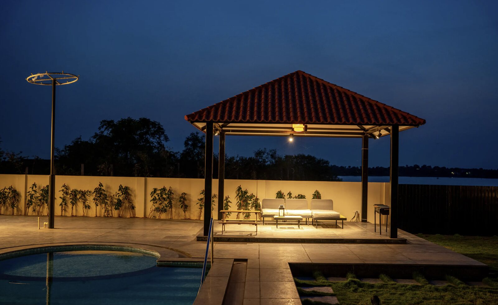 The poolside pavilion at dusk.