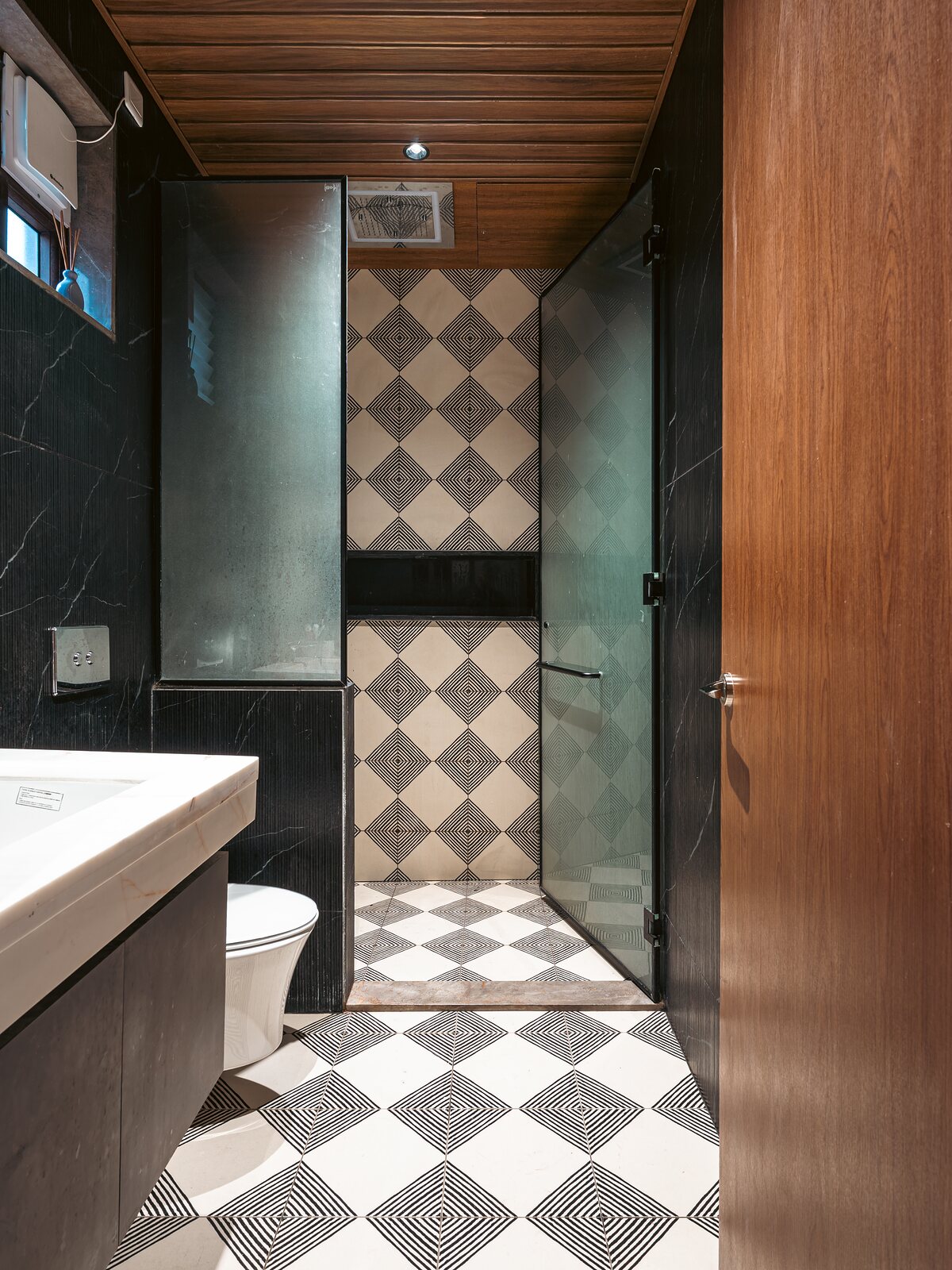 A bathroom in checkerboard marble.