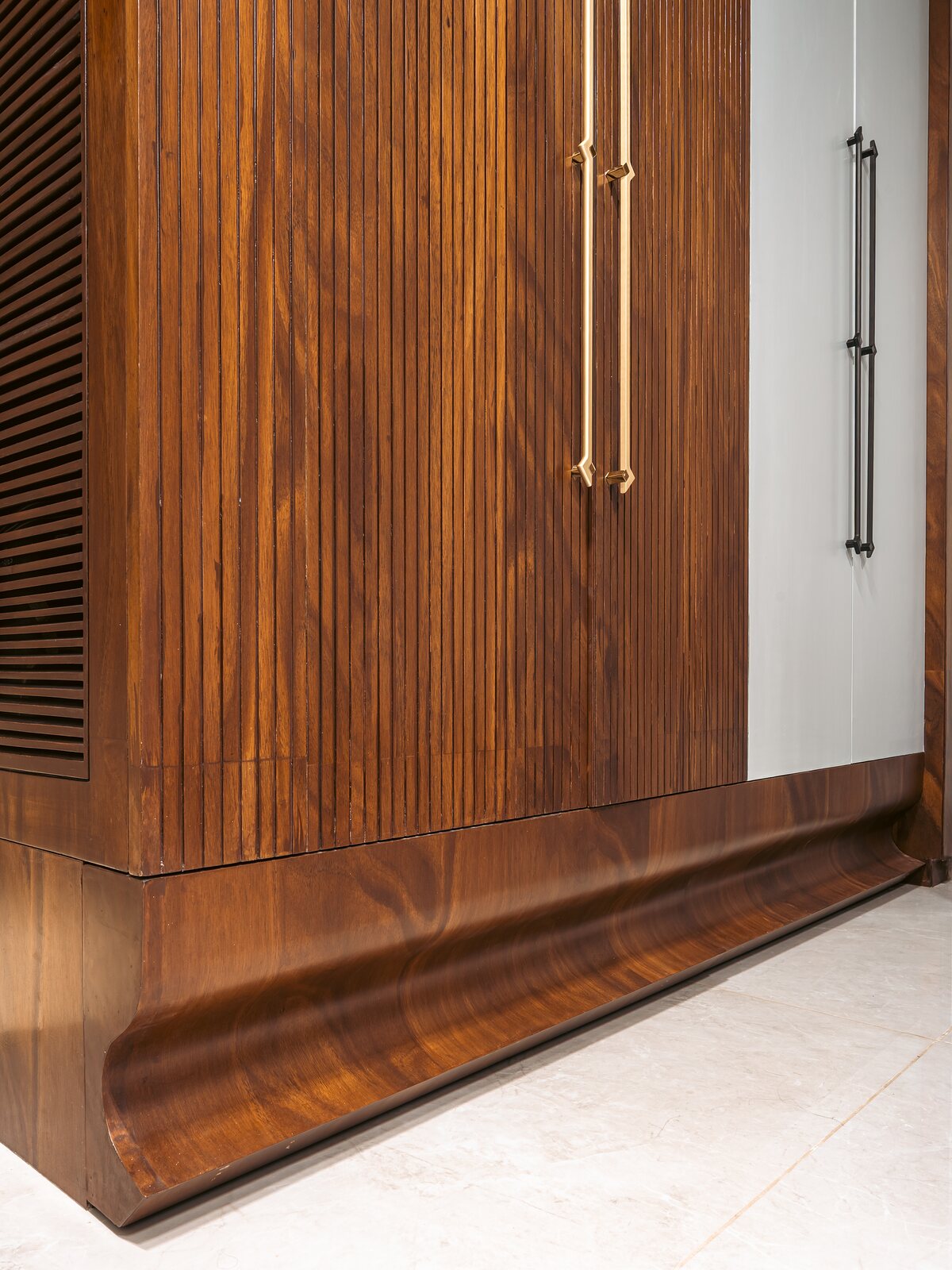 A wardrobe in ribbed timber.