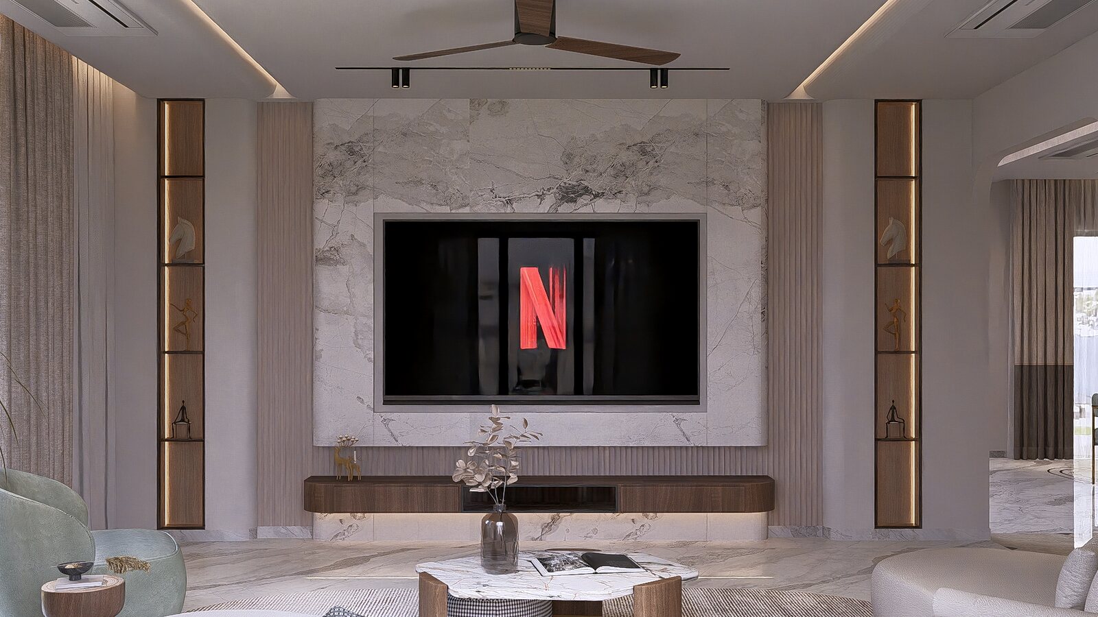 The media wall in book-matched marble and brass.