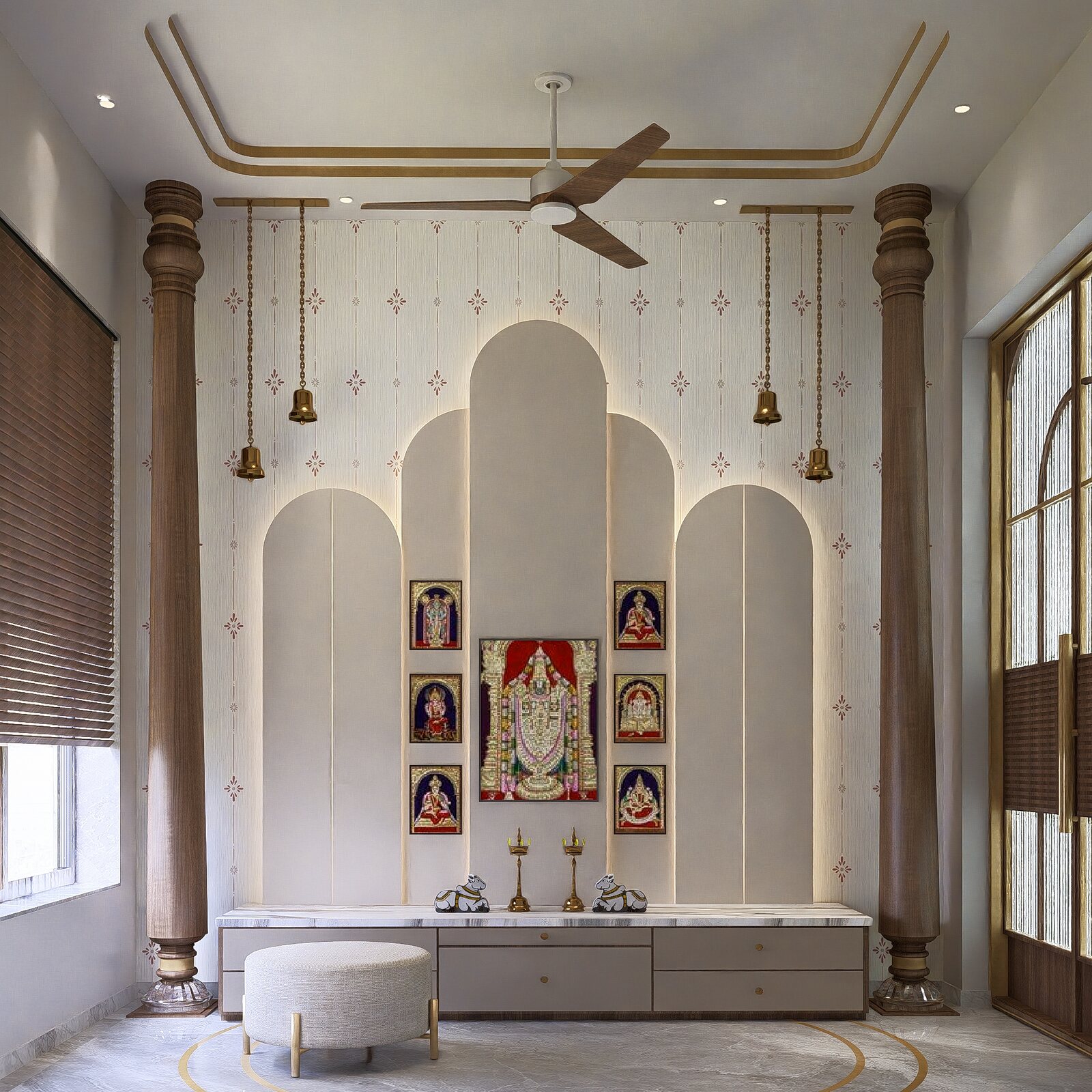 The pooja, deities framed by arched panelling.
