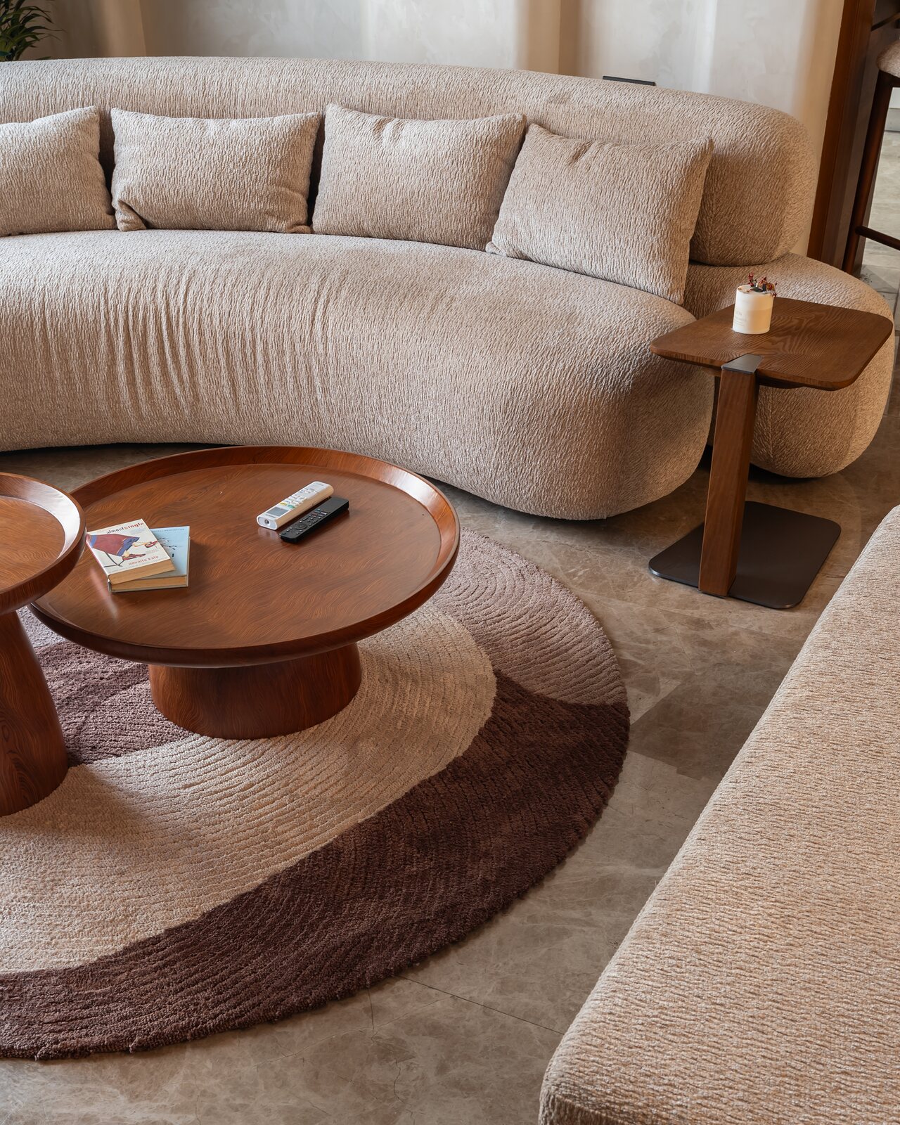 Looking down on the sofa and its circular rug.