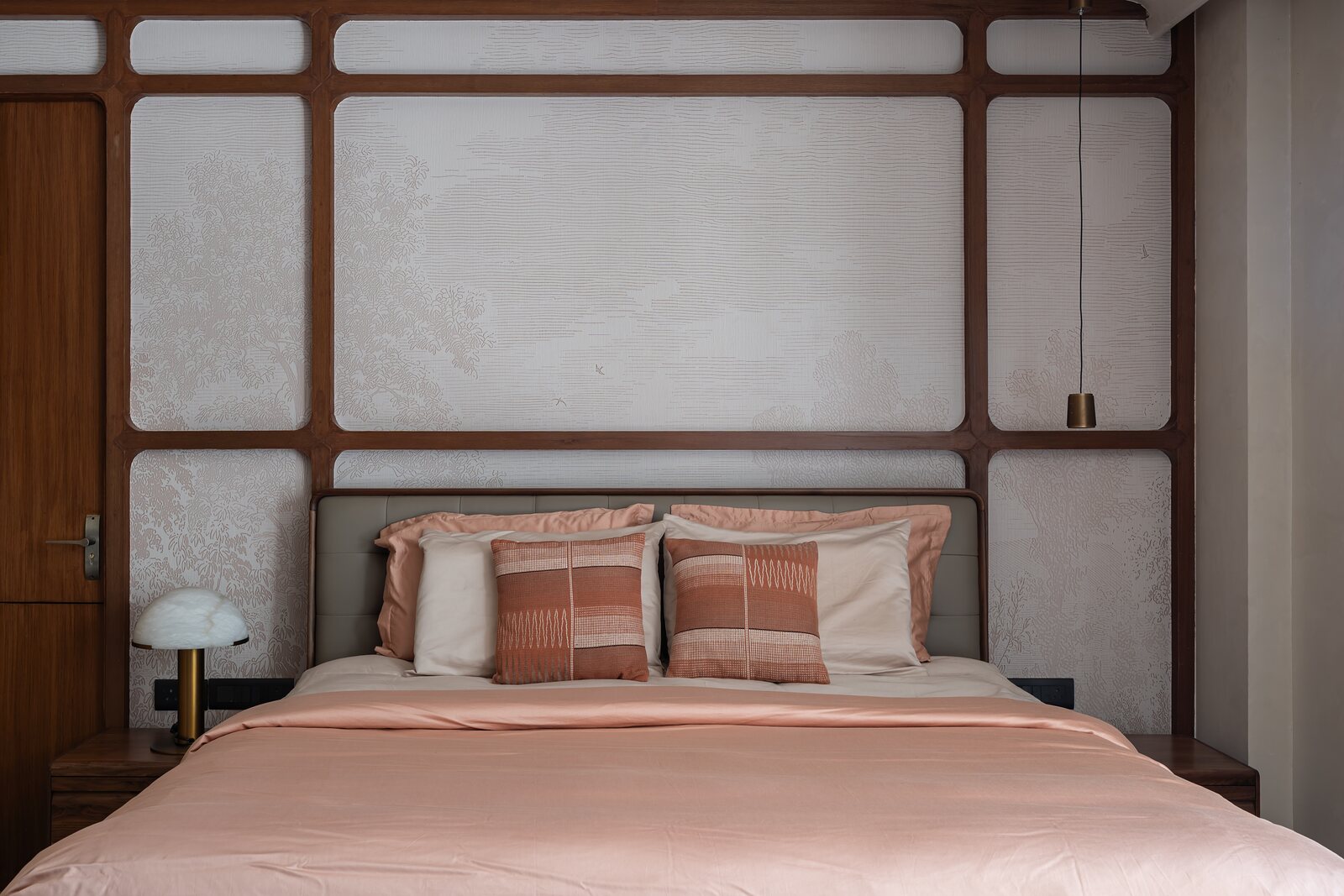 The grid wall carries a printed panel.