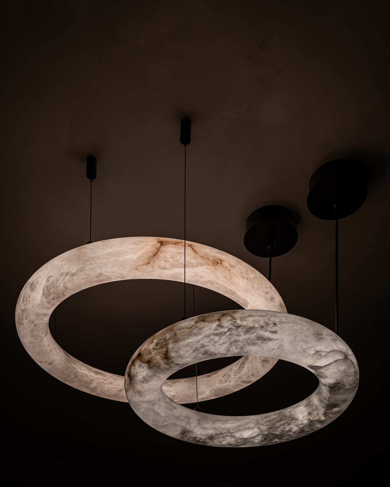 The pendant, two rings of stone.