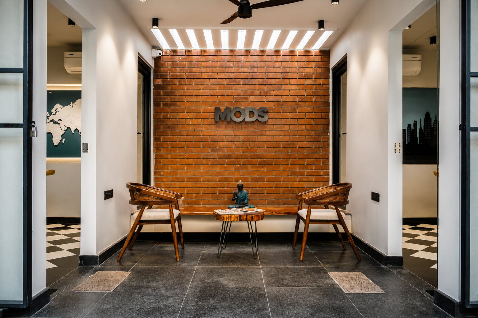 Reception. A brick wall and a checkerboard floor.