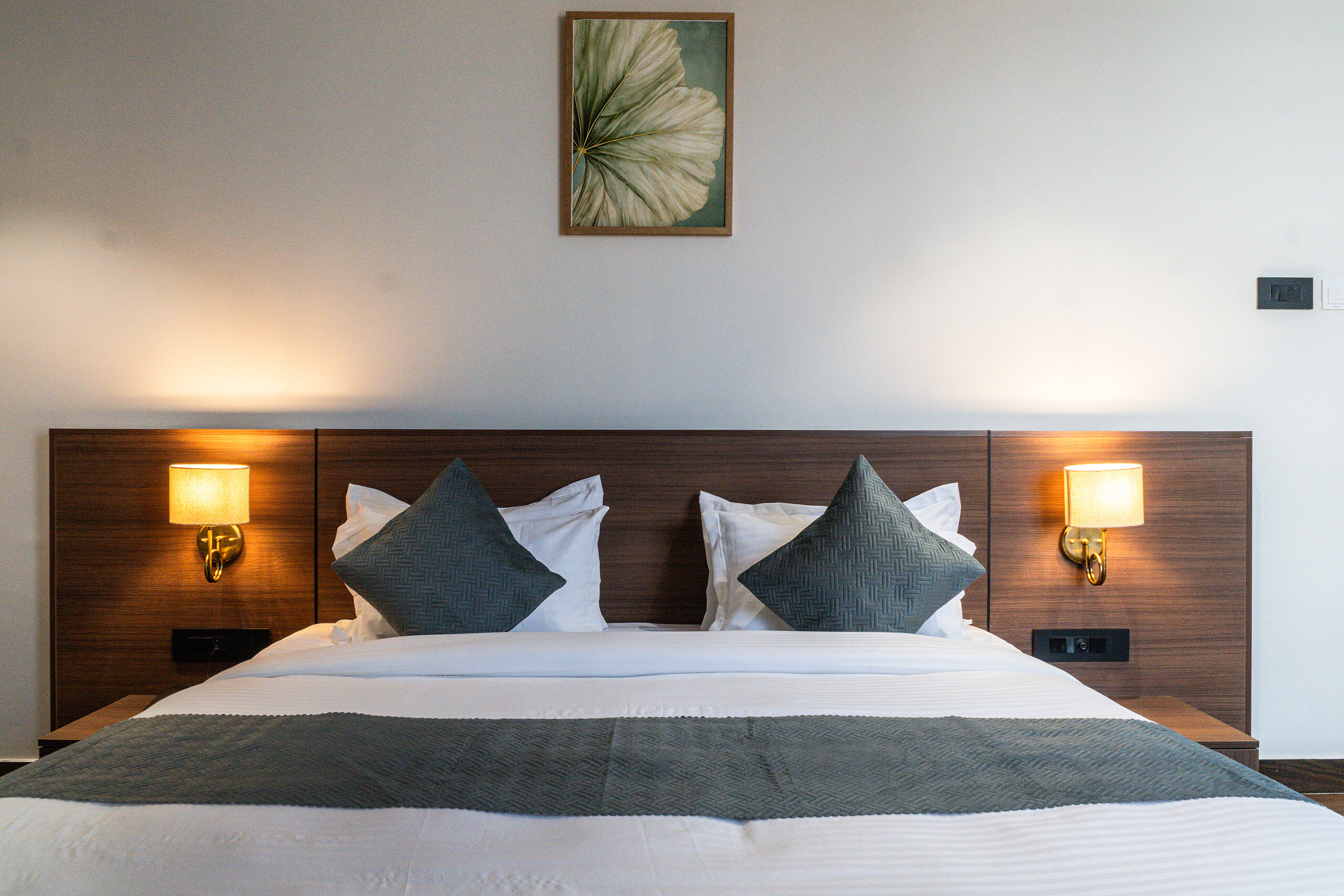 The bed wall.