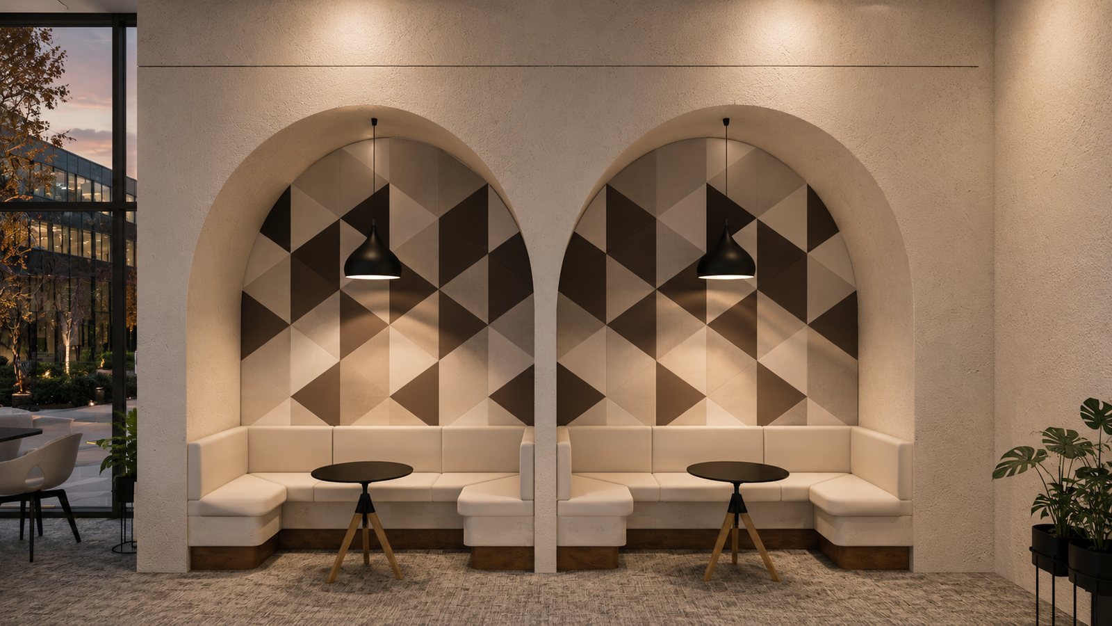 Cafe alcoves set into arched niches behind a geometric screen.