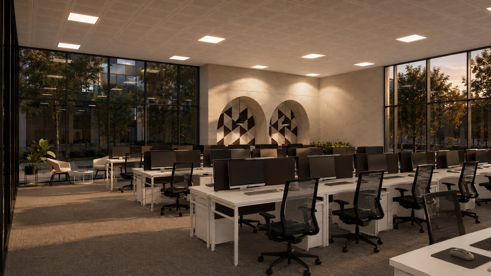 An open workfloor, desks along the windows.