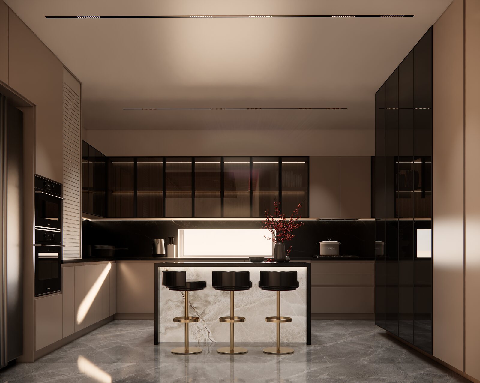 The kitchen. A dark marble island under brass.