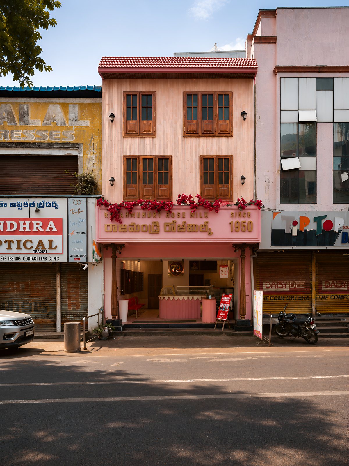 The shopfront by day, quiet on the market street.