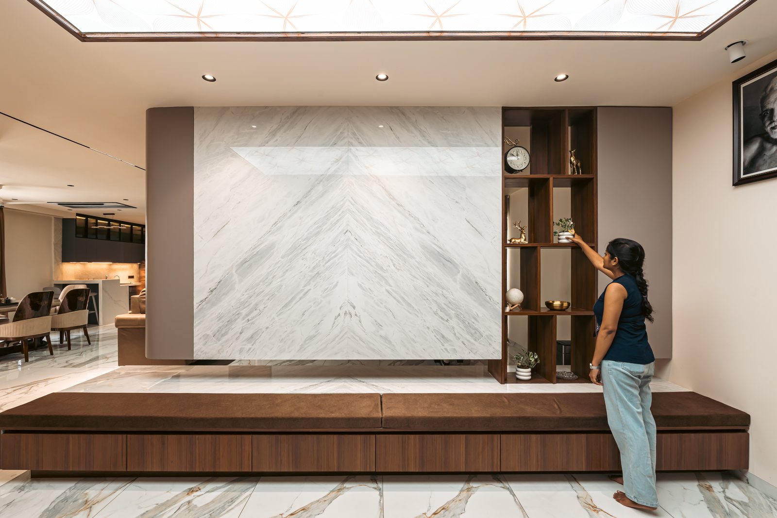 Book-matched marble and walnut shelving.