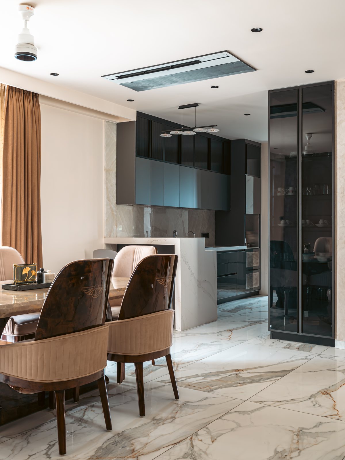 Glass-front cabinets and stone counters.