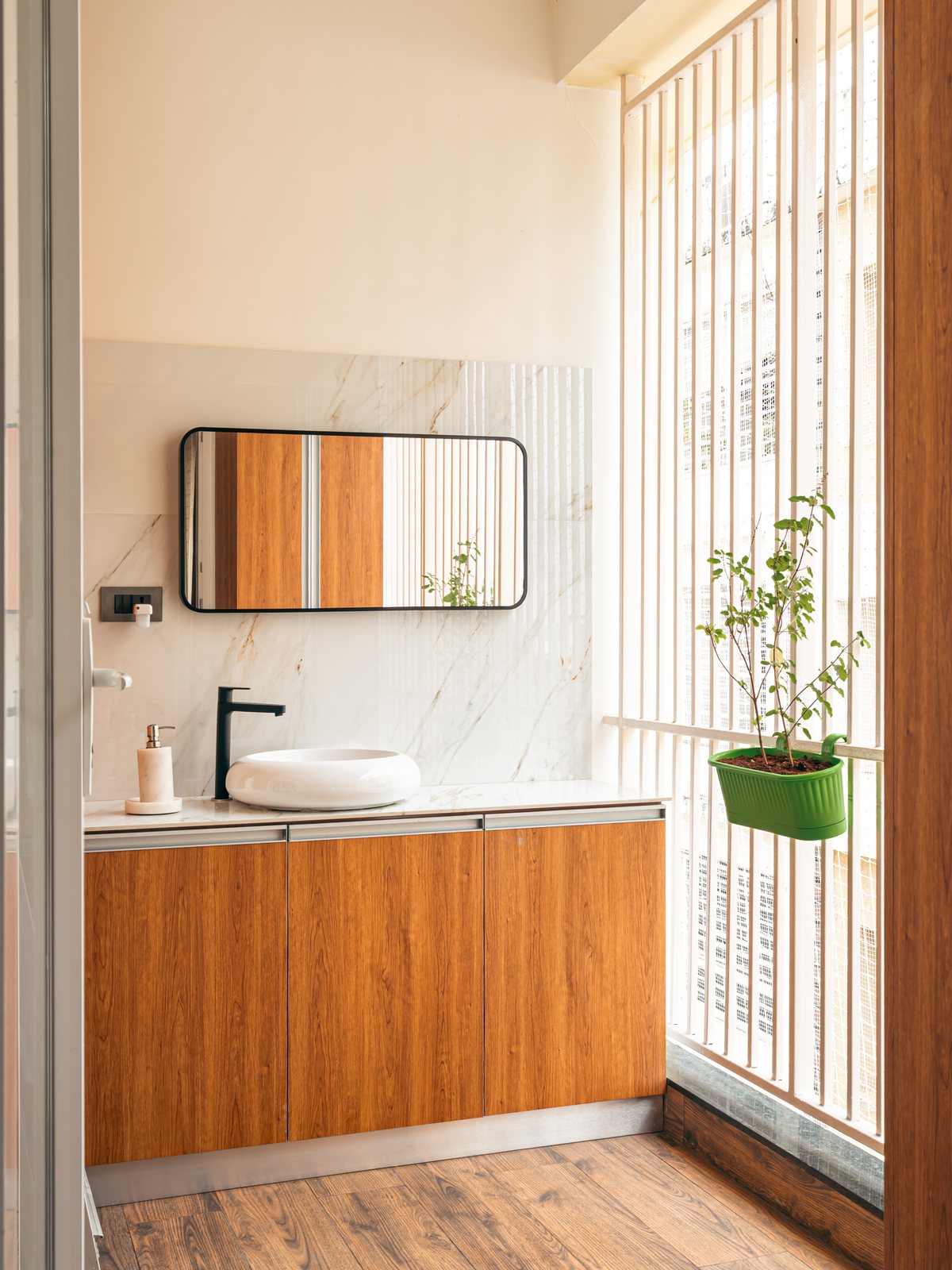 The bath, a stone basin by the window.