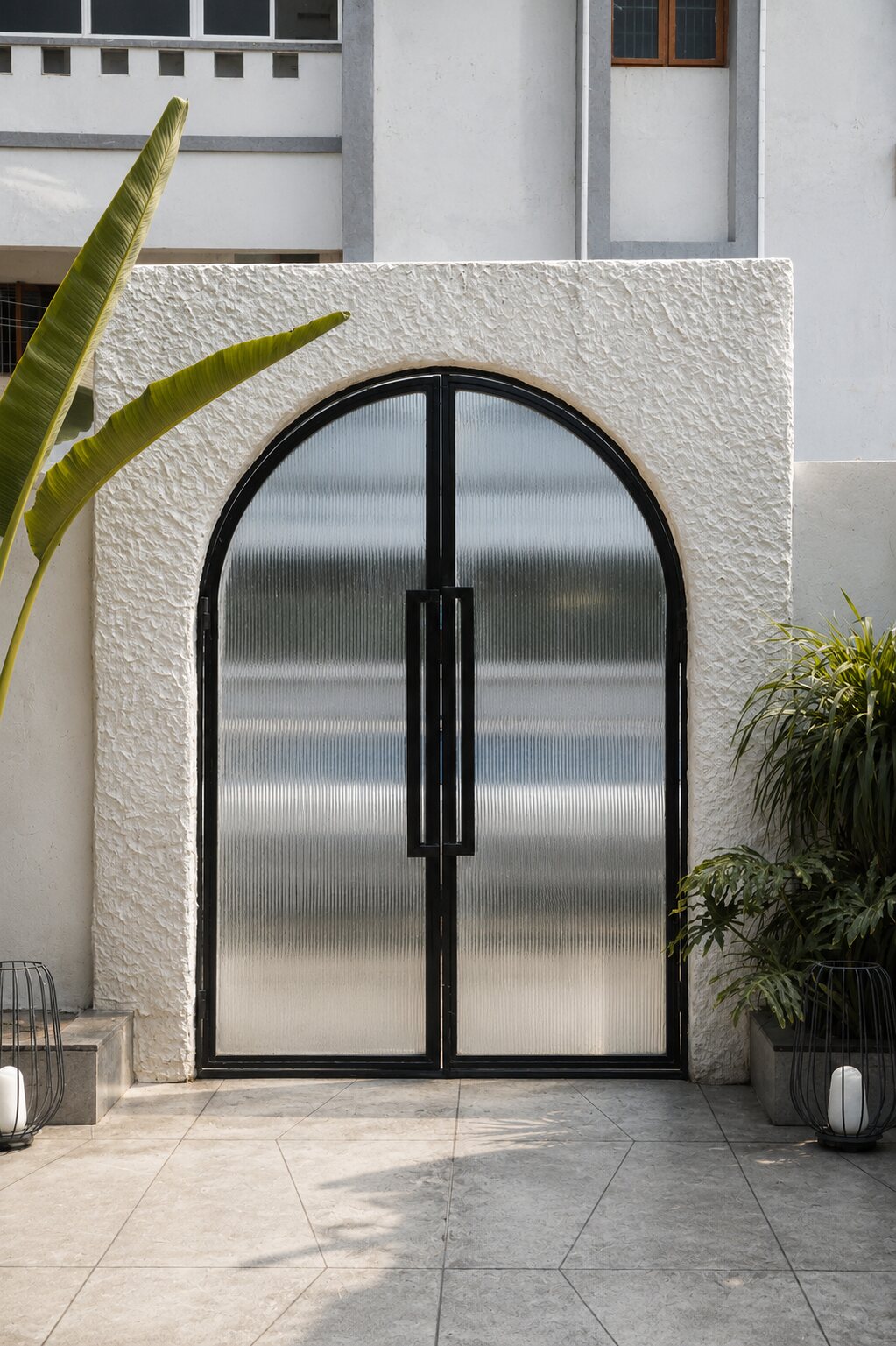 Arched doors in fluted glass.