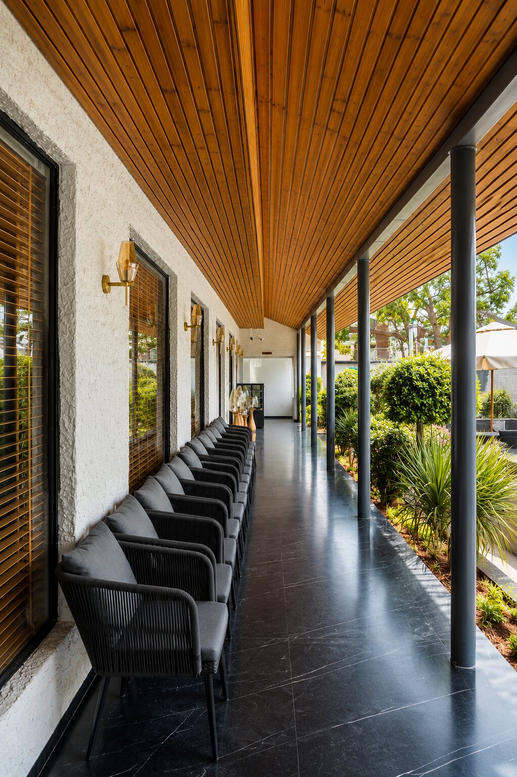 The veranda, bar seating under timber.