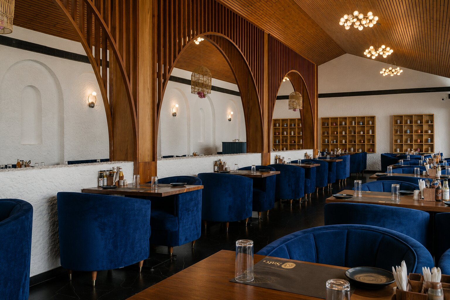 Blue velvet under an arched timber ceiling.