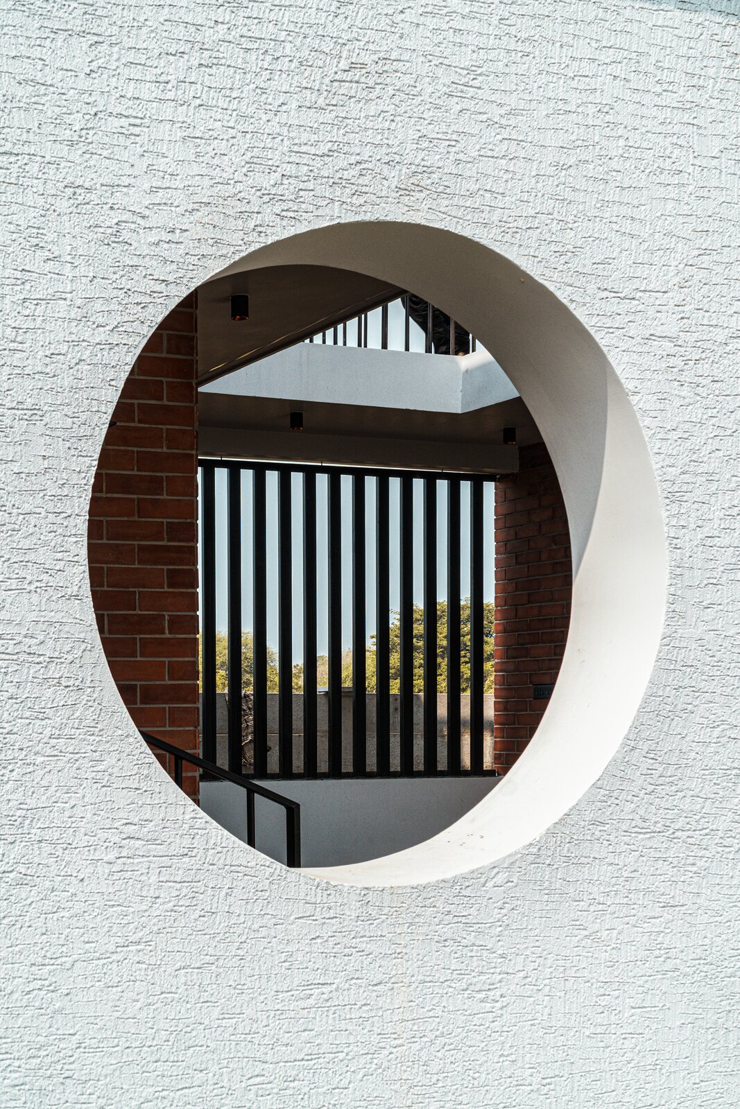The moongate. A circle cut clean through the wall.