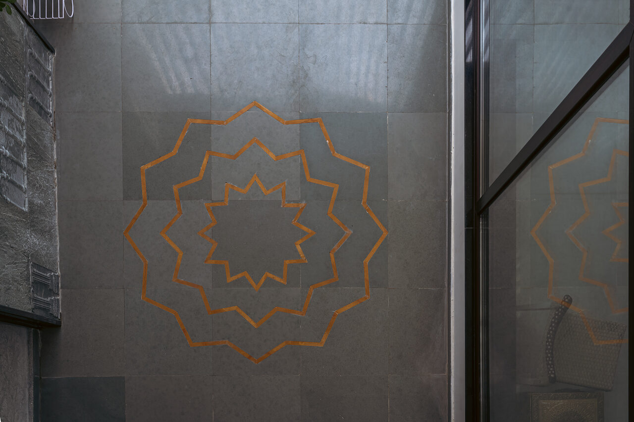 Brass inlay set into the stone floor.